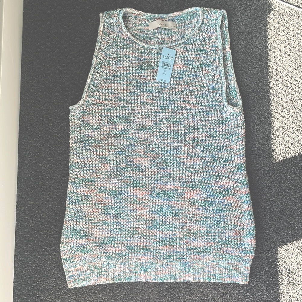 Sleeveless knit sweater vest brand new with tags